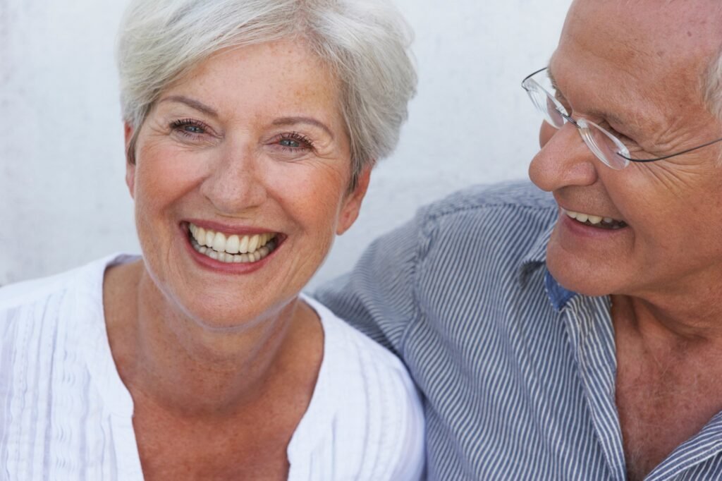 Senior couple smiling close-up